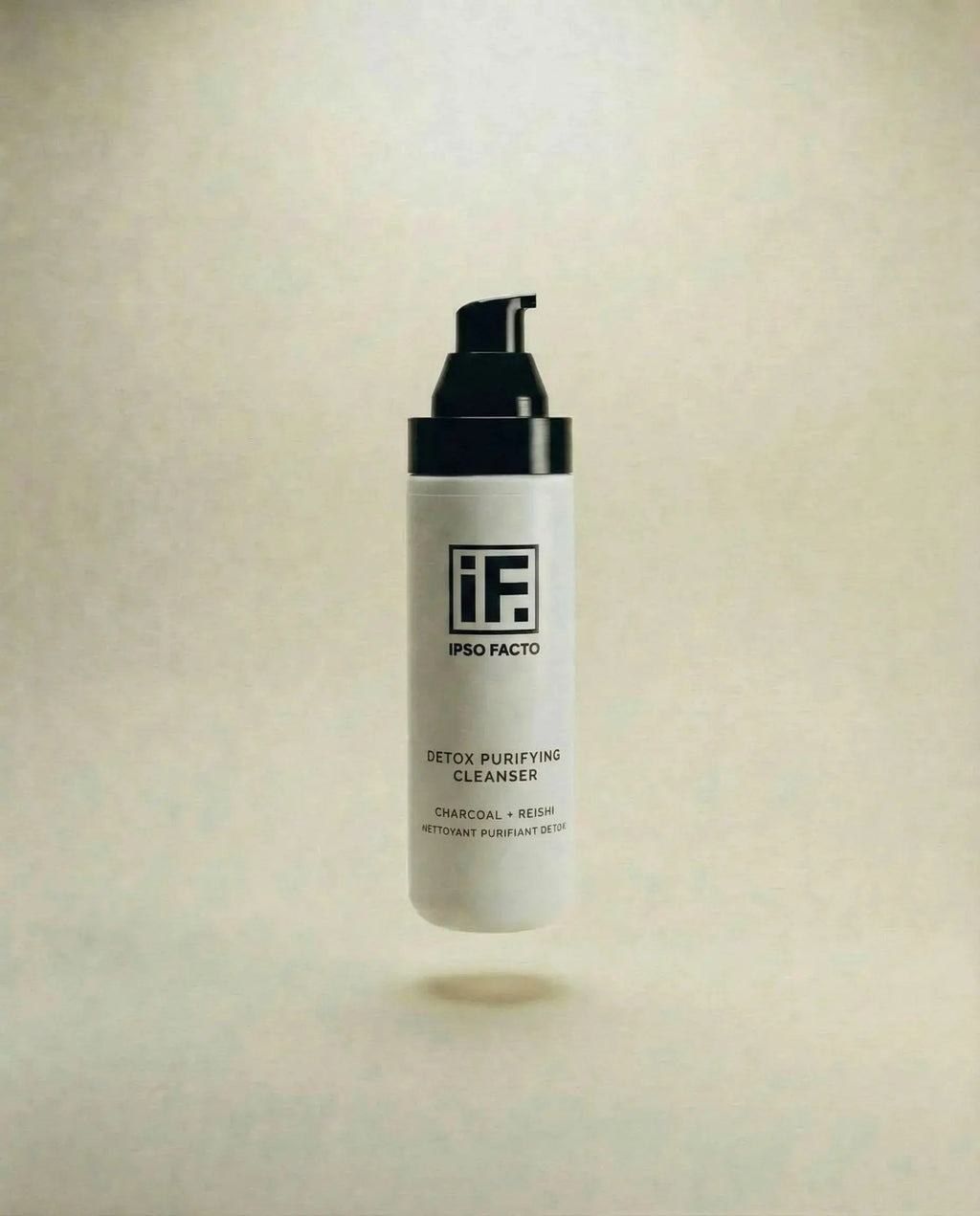Detox Purifying Cleanser bottle with black pump, floating against a neutral background