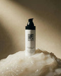 Soapless jelly cleanser bottle on translucent skincare gel with soft lighting
