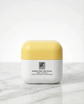 Rosehip Peel and Polish skincare jar with yellow lid on marble surface
